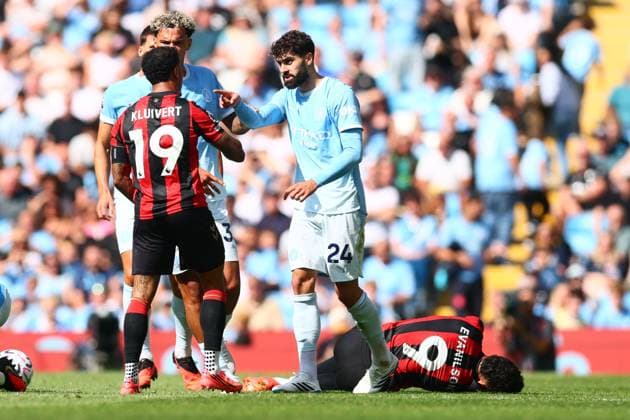Evanilson of AFC Bournemouth holds his face after a challenge from Josko Gvardiol of Manchester City Manchester City v AFC Bournemouth, Premier League Football, Football, Etihad Stadium, Manchester, UK - 23 Aug 2026Manchester Etihad Stadium United Kingdom EDITORIAL USE ONLY No use with unauthorised audio, video, data, fixture lists, club league logos or live services. Online in-match use limited to 120 images, no video emulation. No use in betting, games or single club league player publications.  Copyright: xPaulxCurrie Shutterstockx 17112312aw