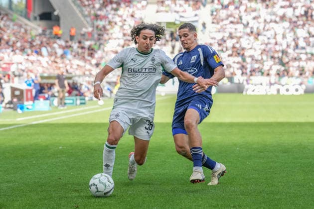 23.08.2026, xydrx, Fußball, DFB Pokal, TSV Schott Mainz - Borussia Mönchengladbach, Saison 2026 2027, MEWA Arena: Wael Mohya (Borussia Moenchengladbach, 36) im Zweikampf gegen Karim Zeghli (TSV Schott Mainz, 17) DFB regulations prohibit any use of photographs as image sequences and or quasi-video. *** August 23, 2026, xydrx, Soccer, DFB Cup, TSV Schott Mainz vs. Borussia Mönchengladbach, 2026–2027 season, MEWA Arena, Wael Mohya (Borussia Mönchengladbach), No. 36 in a tackle against Karim Zeghli (TSV Schott Mainz), No. 17. DFB regulations prohibit any use of photographs as image sequences and or quasi-video. Copyright: HMBxMedia YannisxDreimann