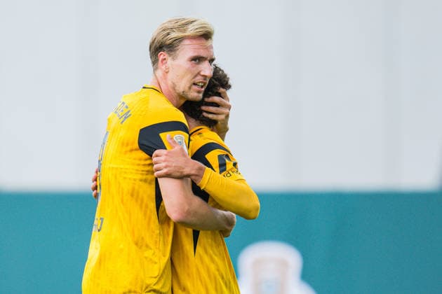 23.08.2026 - Fußball, 2026 2027, DFB-Pokal, 1. Hauptrunde, SV Westfalia Rhynern - SG Dynamo Dresden: (L-R) Vincent Vermeij (Dresden) jubelt nach seinem Tor zum 0:3 mit Ben Bobzien (Dresden) DFB REGULATIONS PROHIBIT ANY USE OF PHOTOGRAPHS AS IMAGE SEQUENCES AND OR QUASI-VIDEO. *** August 23, 2026 Soccer, 2026–2027, DFB Cup, 1st Round, SV Westfalia Rhynern vs. SG Dynamo Dresden, Referee Vincent Vermeij. Dresden celebrates after scoring the 0–3 goal with Ben Bobzien. Dresden. DFB regulations prohibit any use of photographs as image sequences and or quasi-video.