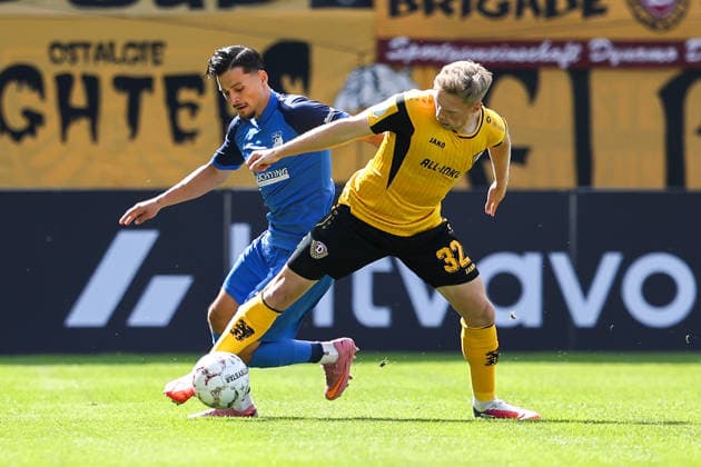2026.08.23, xkwix, Fußball, DFB-Pokal, SV Westfalia Rhynern - Dynamo Dresden, LVM-Preußenstadion, 1.Runde, Saison 2026 2027: Jonas Sterner (Dynamo Dresden 32) im Zweikampf gegen Melih Sayin (SV Westfalia Rhynern 30) DFB regulations prohibit any use of photographs as image sequences and or quasi-video. Photo: xKamilxWilkowskixPressefotoKochx Nordrhein-Westfalen Deutschland *** August 23, 2026, xkwix, Soccer, DFB Cup, SV Westfalia Rhynern vs. Dynamo Dresden, LVM Preußenstadion, 1st Round, 2026–2027 Season: Jonas Sterner of Dynamo Dresden (32) in a tackle against Melih Sayin of SV Westfalia Rhynern (30). DFB regulations prohibit any use of photographs as image sequences and or quasi-video. Photo: xKamilxWilkowskixPressefotoKochx, North Rhine-Westphalia Germany