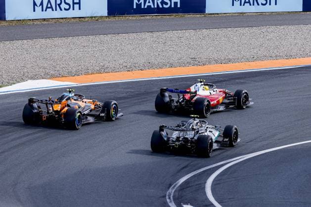 ZANDVOORT - Lewis Hamilton of Great Britain, driver for Scuderia Ferrari HP, and Lando Norris of Great Britain, driver for McLaren Formula 1 Team, overtake Andrea Kimi Antonelli of Italy, driver for Mercedes-AMG PETRONAS F1 Team, during the Formula 1 Heineken Dutch Grand Prix at Circuit Zandvoort on August 23, 2026, in Zandvoort, the Netherlands. MARCEL TER BALS ANP xVIxANPxSportx xMarcelxterxBalsxIVx 566108755 originalFilename: 566108755.jpg