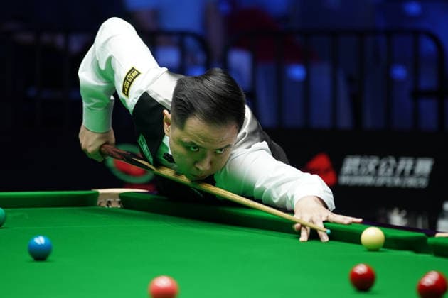 WUHAN, CHINA - AUGUST 23: Xiao Guodong of China plays a shot during his round of 64 match against Wang Xinbo of China at the 2026 Wuhan Open on August 23, 2026 in Wuhan, Hubei Province of China. Xiao defeated Wang 5-0 to advance to the round of 32.  Copyright: xTaixChengzhex 111661673563