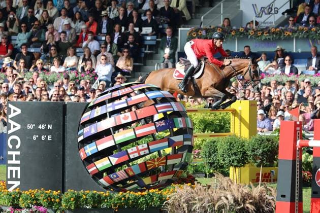Weltmeister Steve Guerdat (SUI, Schweiz) mit Pferd Dynamix de Belheme , Emotion, Jubel, 1. Platz , Springen, FEI Jumping World Championship, WM, Weltmeisterschaft , FEI Jumping World Championship, Competition Individual Final, Longines-Prize, Longines-Preis, Finale Einzelwertung, Jumping , AACHEN - FEI World Championships 2026, Weltfest des Pferdesports, Reitsport Weltmeisterschaft 2026, Aachen 2026, Welcome Home 2026, Aachener Soers, 11. bis 23. August 2026, Reitsport, 23.08.2026, Aachen Aachener Soers Deutschland *** World Champion Steve Guerdat (SUI), Switzerland, riding Dynamix de Belheme; emotion, jubilation, 1st place, Jumping, FEI Jumping World Championship, FEI Jumping World Championship, Individual Final, Longines Prize, Longines Award, Individual Final, Jumping, AACHEN FEI World Championships 2026, World Festival of Equestrian Sports, 2026 Equestrian World Championships, Aachen 2026, Welcome Home 2026, Aachen Soers, August 11–23, 2026, Equestrian Sports, August 23, 2026, Aachen Soers, Germany