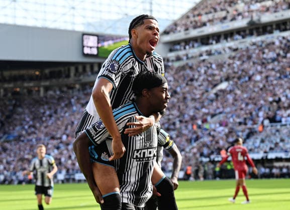Newcastle Upon Tyne, England, 23rd August 2026. Anthony Elanga of Newcastle United celebrates scoring the first goal with William Osula of Newcastle United during the Newcastle United vs Liverpool Premier League match at St. James Park, Newcastle Upon Tyne. Picture credit should read: Anna Gowthorpe Sportimage EDITORIAL USE ONLY. No use with unauthorised audio, video, data, fixture lists, club league logos or live services. Online in-match use limited to 120 images, no video emulation. No use in betting, games or single club league player publications. SPI_027_AG_Newcastle_Liverpool SPI-4932-0027