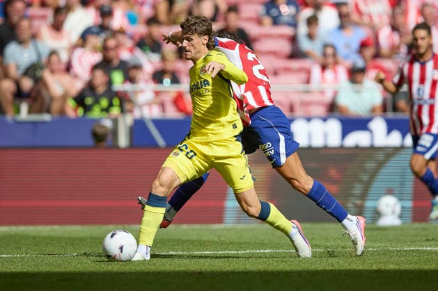 Carlos Romero (Villarreal CF) and Giuliano Simeone (Atletico de Madrid) battle for the ball during the LaLiga EA Sports match between Club AtlÃ tico de Madrid and Villarreal CF at Riyadh Air Metropolitano on August 23, 2026 in Madrid, Spain. (Photo by Manu Reino DeFodi Images) - *** Carlos Romero of Villarreal CF and Giuliano Simeone of Atlético de Madrid battle for the ball during the LaLiga EA Sports match between Club Atlético de Madrid and Villarreal CF at Riyadh Air Metropolitano on August 23, 2026, in Madrid, Spain. Photo by Manu Reino, DeFodi Images