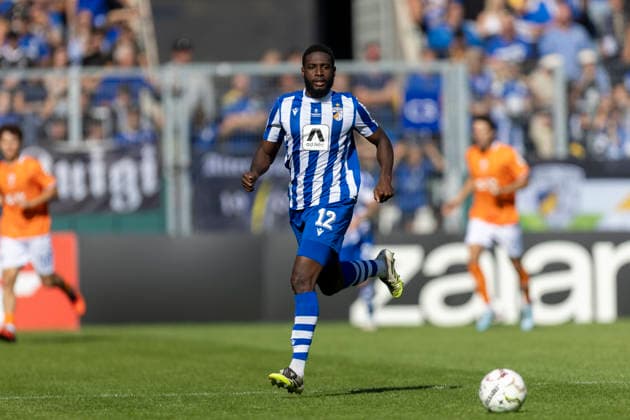 GER, Jena, Fussball, DFB-Pokal, 1. Hauptrunde, FC Carl-Zeiss Jena vs. SV Darmstadt 98 im Bild v.l.: Malik Talabidi (FC Carl-Zeiss Jena 12), Aktion mit Ball 23.08.2026, Ernst Abbe Sportfeld Jena DFB REGULATIONS PROHIBIT ANY USE OF PHOTOGRAPHS AS IMAGE SEQUENCES AND OR QUASI-VIDEO, *** GER, Jena, Soccer, DFB Cup, 1st Round, FC Carl Zeiss Jena vs. SV Darmstadt 98; pictured from left: Malik Talabidi (FC Carl Zeiss Jena 12), in action with the ball, August 23, 2026, Ernst Abbe Sportfeld, Jena. DFB regulations prohibit any use of photographs as image sequences and or quasi-video, Copyright: HMBxMedia PaulxFritz