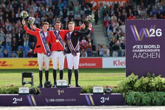Siegerehrung, Podium, 1. Platz, Weltmeister Steve Guerdat (SUI, Schweiz) mit Pferd Dynamix de Belheme, 2. Platz Thibeau Spits (BEL, Belgien, Belgium) mit Pferd Impress-K vaunt Kattenheye Z , Harry Charles (GBR, Vereinigtes Königsreich, Großbritannien) mit Pferd LT Holst Freda, Springen, FEI Jumping World Championship, WM, Weltmeisterschaft , FEI Jumping World Championship, Competition Individual Final, Longines-Prize, Longines-Preis, Finale Einzelwertung, Jumping , AACHEN - FEI World Championships 2026, Weltfest des Pferdesports, Reitsport Weltmeisterschaft 2026, Aachen 2026, Welcome Home 2026, Aachener Soers, 11. bis 23. August 2026, Reitsport, 23.08.2026, Aachen Aachener Soers Deutschland *** Awards Ceremony, Podium, 1st place: World Champion Steve Guerdat (SUI), Switzerland, riding Dynamix de Belheme; 2nd place: Thibeau Spits (BEL), Belgium, riding Impress K vaunt Kattenheye Z; Harry Charles (GBR), United Kingdom, riding LT Holst Freda; Show Jumping, FEI Jumping World Championship, FEI Jumping World Championship, Individual Final, Longines Prize, Longines Prize, Individual Final, Show Jumping, AACHEN FEI World Championships 2026, World Festival of Equestrian Sports, 2026 Equestrian World Championships, Aachen 2026, Welcome Home 2026, Aachen Soers, August 11–23, 2026, Equestrian Sports, August 23, 2026, Aachen Soers, Germany