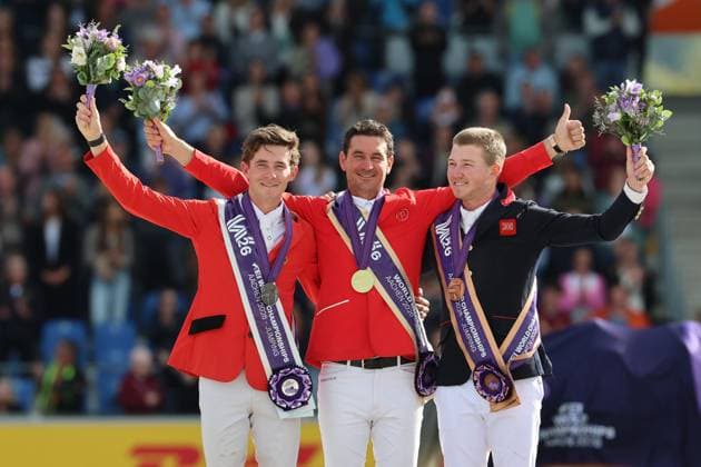 Siegerehrung, Podium, 1. Platz, Weltmeister Steve Guerdat (SUI, Schweiz) mit Pferd Dynamix de Belheme, 2. Platz Thibeau Spits (BEL, Belgien, Belgium) mit Pferd Impress-K vaunt Kattenheye Z , Harry Charles (GBR, Vereinigtes Königsreich, Großbritannien) mit Pferd LT Holst Freda, Springen, FEI Jumping World Championship, WM, Weltmeisterschaft , FEI Jumping World Championship, Competition Individual Final, Longines-Prize, Longines-Preis, Finale Einzelwertung, Jumping , AACHEN - FEI World Championships 2026, Weltfest des Pferdesports, Reitsport Weltmeisterschaft 2026, Aachen 2026, Welcome Home 2026, Aachener Soers, 11. bis 23. August 2026, Reitsport, 23.08.2026, Aachen Aachener Soers Deutschland *** Awards Ceremony, Podium, 1st place: World Champion Steve Guerdat (SUI), Switzerland, riding Dynamix de Belheme; 2nd place: Thibeau Spits (BEL), Belgium, riding Impress K vaunt Kattenheye Z; Harry Charles (GBR), United Kingdom, riding LT Holst Freda; Show Jumping, FEI Jumping World Championship, FEI Jumping World Championship, Individual Final, Longines Prize, Longines Prize, Individual Final, Show Jumping, AACHEN FEI World Championships 2026, World Festival of Equestrian Sports, 2026 Equestrian World Championships, Aachen 2026, Welcome Home 2026, Aachen Soers, August 11–23, 2026, Equestrian Sports, August 23, 2026, Aachen Soers, Germany