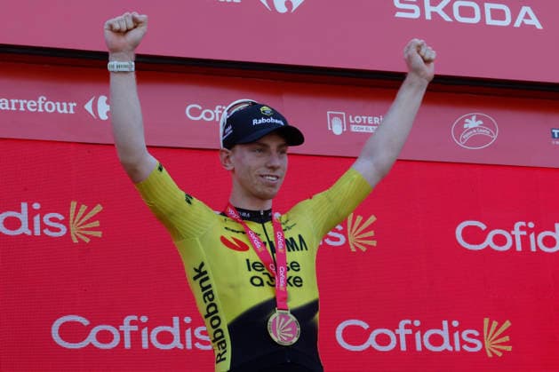 British cyclist James Matthew Brennan, of Visma-Lease a Bike team, celebrates on the podium after he won the second stage of La Vuelta a Espana cycling tour, between Monaco and French town of Manosque covering 214.3 km. Second stage of La Vuelta cycling tour !ACHTUNG: NUR REDAKTIONELLE NUTZUNG!  Copyright: xJavierxLizonx GRAF3643 20260823-55021209552_1
