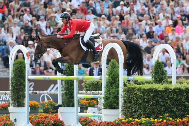 Weltmeister Steve Guerdat (SUI, Schweiz) mit Pferd Dynamix de Belheme am WM-Sprung , Springen, FEI Jumping World Championship, WM, Weltmeisterschaft , FEI Jumping World Championship, Competition Individual Final, Longines-Prize, Longines-Preis, Finale Einzelwertung, Jumping , AACHEN - FEI World Championships 2026, Weltfest des Pferdesports, Reitsport Weltmeisterschaft 2026, Aachen 2026, Welcome Home 2026, Aachener Soers, 11. bis 23. August 2026, Reitsport, 23.08.2026, Aachen Aachener Soers Deutschland *** World Champion Steve Guerdat (SUI, Switzerland) with his horse Dynamix de Belheme at the World Championships in Jumping, FEI Jumping World Championship, FEI Jumping World Championship, Individual Final, Longines Prize, Jumping, AACHEN FEI World Championships 2026, World Festival of Equestrian Sports, 2026 Equestrian World Championships, Aachen 2026, Welcome Home 2026, Aachen Soers, August 11–23, 2026, Equestrian Sports, August 23, 2026, Aachen Soers, Germany