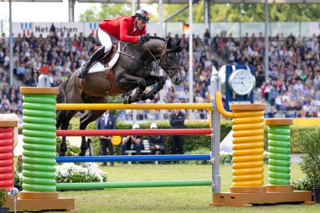Daniel DEUSSER (GER) auf Otello de Guldenboom, im Sprung, Einzelbild, Einzelaktion, Aktion, Springen S3, Umlauf B, FEI Jumping World Championship, WM, Weltmeisterschaft - Individual Final - LONGINES-Preis, am 23.08.2026, FEI Reit Weltmeisterschaft Aachen 2026 vom 11. - 23.08.2026 in Aachen Deutschland; Â *** Daniel DEUSSER (GER) on Otello de Guldenboom, in mid-jump, single frame, single action, action, Jumping S3, Round B, FEI Jumping World Championship Individual Final LONGINES Prize, on August 23, 2026, FEI World Equestrian Games Aachen 2026, August 11–23, 2026, in Aachen, Germany Â