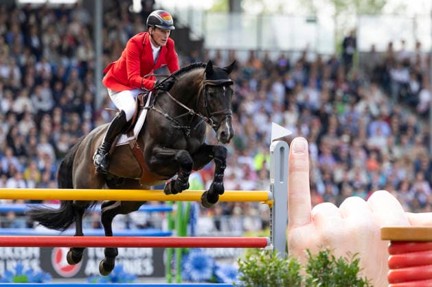 Daniel DEUSSER (GER) auf Otello de Guldenboom, im Sprung, Einzelbild, Einzelaktion, Aktion, Springen S3, Umlauf B, FEI Jumping World Championship, WM, Weltmeisterschaft - Individual Final - LONGINES-Preis, am 23.08.2026, FEI Reit Weltmeisterschaft Aachen 2026 vom 11. - 23.08.2026 in Aachen Deutschland; Â *** Daniel DEUSSER (GER) on Otello de Guldenboom, in mid-jump, single frame, single action, action, Jumping S3, Round B, FEI Jumping World Championship Individual Final LONGINES Prize, on August 23, 2026, FEI World Equestrian Games Aachen 2026, August 11–23, 2026, in Aachen, Germany Â