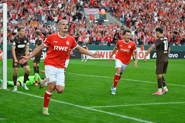 Essen, Stadion an der Hafenstrasse, 23.08.26, GER, Herren, DFB-Pokal, 1.Runde, Saison 2026-2027: RW Essen - FC St.Pauli Bild: Marek JANSSEN (Essen) jubelt nach seinem Tor zum 1:0 Only for editorial use! DFB regulations prohibit any use of photographs as image sequences and or quasi-video. Nordrhein-Westfalen Deutschland *** Essen, Stadion an der Hafenstrasse, August 23, 2026, GER, Men’s, DFB Cup, 1st Round, 2026–2027 Season, RW Essen vs. FC St. Pauli. Photo by Marek JANSSEN. Essen celebrates after scoring the 1–0 goal. For editorial use only. DFB regulations prohibit any use of photographs as image sequences and or quasi-video. North Rhine-Westphalia, Germany