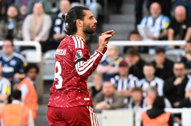 Newcastle Upon Tyne, England, 23rd August 2026. Dominik Szoboszlai of Liverpool appears to taunt the Newcastle fans after scoring from the penalty spot to equalise in extra time during the Newcastle United vs Liverpool Premier League match at St. James Park, Newcastle Upon Tyne. Picture credit should read: Anna Gowthorpe Sportimage EDITORIAL USE ONLY. No use with unauthorised audio, video, data, fixture lists, club league logos or live services. Online in-match use limited to 120 images, no video emulation. No use in betting, games or single club league player publications. SPI_058_AG_Newcastle_Liverpool SPI-4932-0059