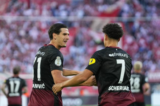 Igor Matanovic (SC Freiburg, 31) Torjubel, Emotionen, Torschuss, Abschluss, Torerfolg, Tor, Treffer, Derry Scherhant (SC Freiburg, 07) , Deutschland, Fußball, 1. Runde, DFB Pokal, 2026 2027, Fortuna Düsseldorf vs. SC Freiburg, 23.08.2026, Merkur Spiel-Arena, Düsseldorf Düsseldorf Merkur Spiel-Arena Nordrhein-Westfalen Deutschland *** Igor Matanovic, SC Freiburg, 31 goal celebration, emotions, shot on goal, finish, goal scored, goal, Derry Scherhant, SC Freiburg, 07, Germany, soccer, Round 1, DFB Cup, 2026–2027, Fortuna Düsseldorf vs. SC Freiburg, August 23, 2026, Merkur Spiel Arena, Düsseldorf, Düsseldorf, Merkur Spiel Arena, North Rhine-Westphalia, Germany Copyright: xArnexAmbergx