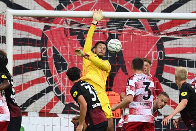 Fabian SCHLEUSENER (D) schiesst das Tor zum 1:3 gegen Torwart Mio BACKHAUS (FR) Fussball DFB Pokal, 1. Hauptrunde, Fortuna Duesseldorf (D) - SC Freiburg (FR) 1-5 am 23.08.2026 in der Merkur Spiel Arena Duesseldorf Deutschland. DFL DFB regulations prohibit any use of photographs as image sequences and or quasi-video Â *** Fabian SCHLEUSENER (D) scores the goal to make it 1–3 against goalkeeper Mio BACKHAUS (FR) in a DFB Cup soccer match, 1st Round, Fortuna Düsseldorf (D) vs. SC Freiburg (FR) 1–5 on August 23, 2026, at the Merkur Spiel Arena in Düsseldorf, Germany. DFL and DFB regulations prohibit any use of photographs as image sequences and or quasi-video. Â