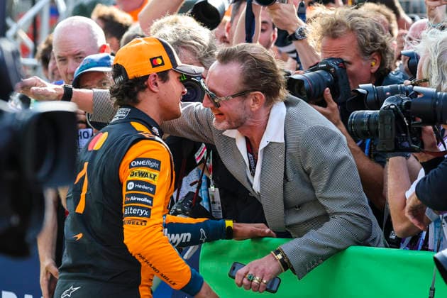 August 23, 2026, Zandvoort, Kaohsiung City, Netherlands: LANDO NORRIS of McLaren F1 Team receives a congratulatory embrace following the 2026 Formula 1 Dutch Grand Prix. 2026 Dutch Grand Prix  - ZUMAh201 20260823_zsp_h201_066 Copyright: xYichinxHoux