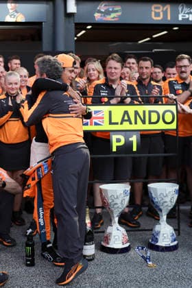 August 23, 2026, Zandvoort, Kaohsiung City, Netherlands: LANDO NORRIS embraces McLaren F1 Team Principal ANDREA STELLA in front of the team and the championship trophies following the 2026 Formula 1 Dutch Grand Prix. 2026 Dutch Grand Prix  - ZUMAh201 20260823_zsp_h201_094 Copyright: xYichinxHoux