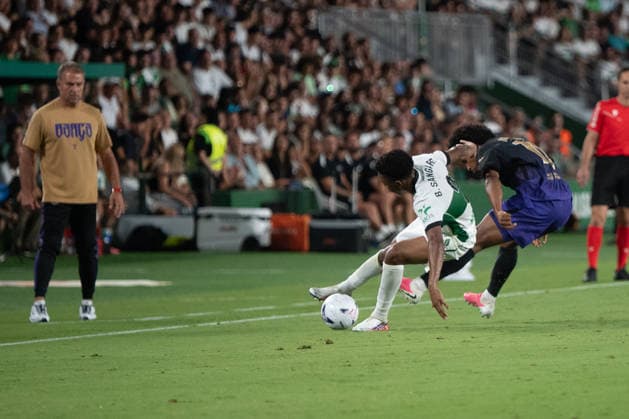 August 23, 2026, Elche, Alicante, Spain: 2 BUBA SANGARE control the ball in front of 15 ADEYEMI during the match between Elche CF and FC Barcelona, Barca from LaLiga EASports, matchweek 2, disputed at the MartoÂ­nez Valero stadium, Alicante Elche Spain - ZUMAc290 20260823_zsp_c290_043 Copyright: xJordixCantox
