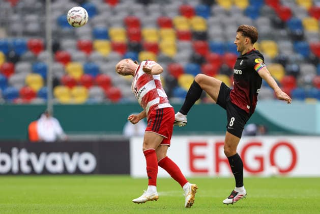 Jorrit Hendrix (Fortuna Duesseldorf) und Maximilian Eggestein (SC Freiburg) im Zweikampf waehrend des Spiels der 1. Runde des DFB-Pokal zwischen Fortuna Duesseldorf und SC Freiburg, Merkur Spiel-Arena am 23. August 2026 in Duesseldorf, Deutschland. (Foto von Oliver Kaelke DeFodi Images) +++ Jorrit Hendrix (Fortuna Duesseldorf) und Maximilian Eggestein (SC Freiburg) battle for the ball during the 1st round match of the DFB-Pokal between Fortuna Duesseldorf and SC Freiburg at Merkur Spiel-Arena on August 23, 2026 in Dusseldorf, Germany. (Photo by Oliver Kaelke DeFodi Images) DFB DFL REGULATIONS PROHIBIT ANY USE OF PHOTOGRAPHS AS IMAGE SEQUENCES AND OR QUASI-VIDEO. (Photo by Oliver Kaelke DeFodi Images) - *** Jorrit Hendrix of Fortuna Düsseldorf and Maximilian Eggestein of SC Freiburg in a tackle during the first-round DFB Cup match between Fortuna Düsseldorf and SC Freiburg at the Merkur Spiel Arena on August 23, 2026, in Düsseldorf, Germany. Photo by Oliver Kaelke, DeFodi Images. Jorrit Hendrix of Fortuna Düsseldorf and Maximilian Eggestein of SC Freiburg battle for the ball during the first-round match of the DFB Cup between Fortuna Düsseldorf and SC Freiburg at the Merkur Spiel Arena on August 23, 2026 in Düsseldorf, Germany. Photo by Oliver Kaelke, DeFodi Images. DFB and DFL regulations prohibit any use of photographs as image sequences and or quasi-video. Photo by Oliver Kaelke, DeFodi Images.