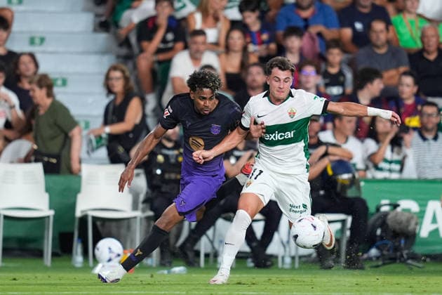 August 23, 2026, Elche, Elche, Spain: Lamine Yamal of FC Barcelona, Barca and German Valera of Elche CF compete for the ball during the Spanish League, LaLiga EA Sports, football match played between Elche CF and FC Barcelona at Estadio Manuel Martinez Valero on August 23, 2026, in Elche, Spain. Elche CF V FC Barcelona - LaLiga EA Sports  - ZUMAa181 20260823_zaa_a181_181 Copyright: xDennisxAgyemanx