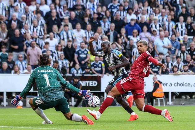 Premier League: Newcastle Untied v Liverpool Liverpool goalkeeper Alisson Becker blocks a shot on goal from Yoane Wissa of Newcastle United during the Premier League match Newcastle Untied vs Liverpool at St. James s Park, Newcastle, United Kingdom on 23 August 2026 (Photo by Alfie Cosgrove News Images) Newcastle St. James s Park Tyne and Wear United Kingdom Copyright: xAlfiexCosgrove NewsxImagesx