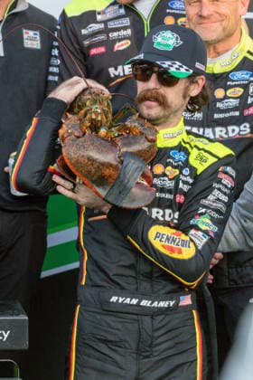 LOUDON, NH - AUGUST 23: Ryan Blaney ( 12 Team Penske Menards Dutch Boy Ford) puts the lobster on his shoulder after winning the NASCAR, Motorsport, USA Cup Series Dollar Tree 301 on August 23, 2026, at New Hampshire Motor Speedway in Loudon, NH. (Photo by David Hahn Icon Sportswire) AUTO: AUG 23 NASCAR Cup Series Dollar Tree 301 EDITORIAL USE ONLY Icon260823025