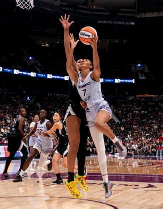August 23, 2026, Vancouver, Bc, CANADA: Toronto Tempo s Teonni Key (7) lays up while Las Vegas Aces A ja Wilson (22) defends during the second half of a WNBA, Basketball Damen, USA basketball game, in Vancouver, on Sunday Aug. 23, 2026. Canada News - August 23, 2026  - ZUMAc35_ 20260823_zaf_c35_181 Copyright: xJacobxMallarix