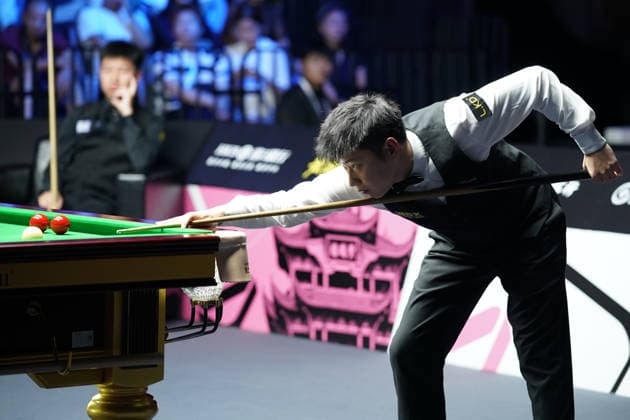 WUHAN, CHINA - AUGUST 24: Zhao Xintong of China plays a shot in the second round match against Gao Yang of China on day 2 of Wuhan Open 2026 at the Optics Valley Gymnasium of Huazhong University of Science and Technology on August 24, 2026 in Wuhan, Hubei Province of China.  Copyright: xTaixChengzhex 111661852722