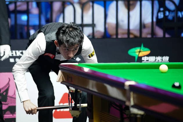 WUHAN, CHINA - AUGUST 24: Wu Yize of China plays a shot in the second round match against Artemijs Zizins of Latvia on day 2 of Wuhan Open 2026 at the Optics Valley Gymnasium of Huazhong University of Science and Technology on August 24, 2026 in Wuhan, Hubei Province of China.  Copyright: xTaixChengzhex 111661853322