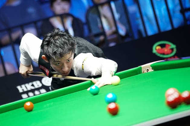 WUHAN, CHINA - AUGUST 24: Wu Yize of China plays a shot in the second round match against Artemijs Zizins of Latvia on day 2 of Wuhan Open 2026 at the Optics Valley Gymnasium of Huazhong University of Science and Technology on August 24, 2026 in Wuhan, Hubei Province of China.  Copyright: xTaixChengzhex 111661853309