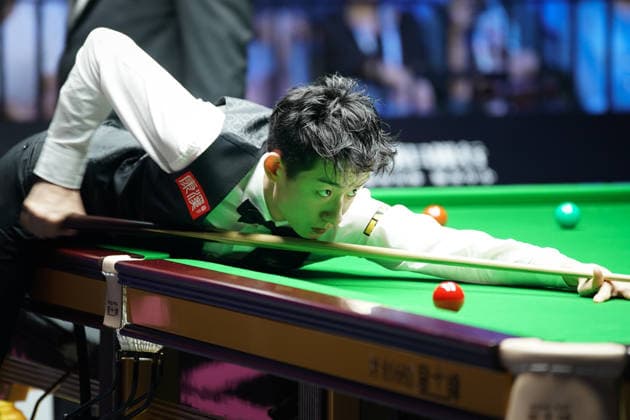 WUHAN, CHINA - AUGUST 24: Wu Yize of China plays a shot in the second round match against Artemijs Zizins of Latvia on day 2 of Wuhan Open 2026 at the Optics Valley Gymnasium of Huazhong University of Science and Technology on August 24, 2026 in Wuhan, Hubei Province of China.  Copyright: xTaixChengzhex 111661853318