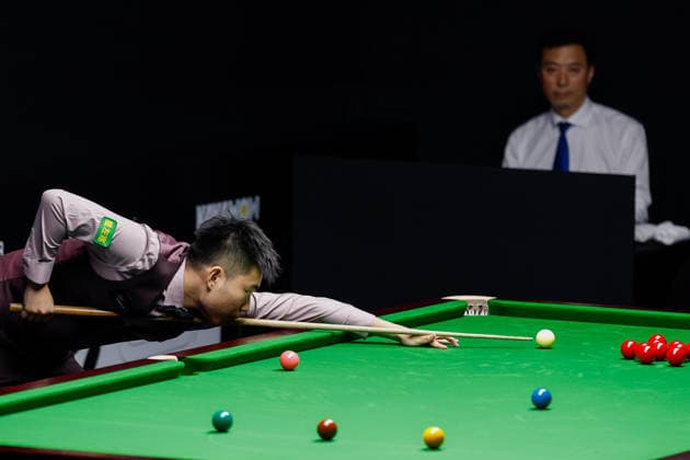 (260824) -- WUHAN, Aug. 24, 2026 -- Fan Zhengyi competes during a round 2 match between Mark Selby of England and Fan Zhengyi of China at Wuhan Open 2026 snooker tournament in Wuhan, central China s Hubei Province, Aug. 24, 2026. ) (SP)CHINA-SNOOKER-WUHAN OPEN WuxZhizun 
