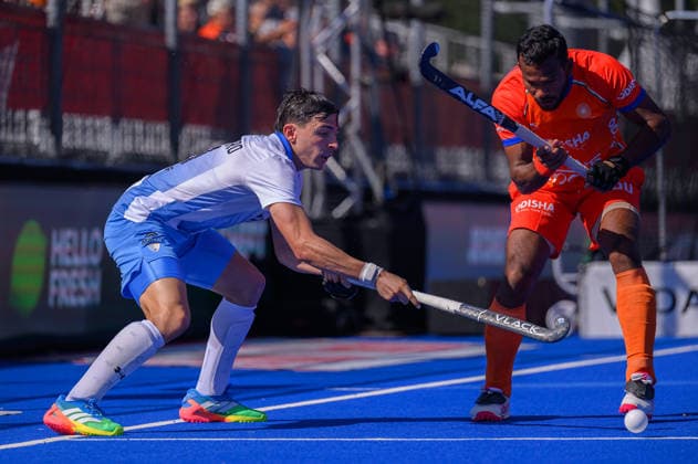 Hockey World Cup Day Ten Bautista Capurro of Argentina (Los Leones) pushes the ball past Amit Rohidas of India during the match between Argentina and India in Pool E of the 2026 FIH Hockey World Cup at Wagener Stadium, Amstelveen 24 08 2026 UK Newspapers OUT Copyright: xGraemexWilcocksonx FIL-23822-0038