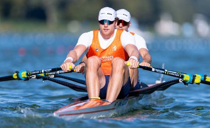 AMSTERDAM - Simon van Dorp and Melvin Twellaar in action during the heats for the men s double sculls at the World Rowing Championships on the Bosbaan in the Amsterdam Forest. IRIS VAN DEN BROEK ANP xVIxANPxSportx xxANPxIVx 566200476 originalFilename: 566200476.jpg