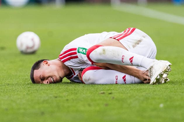WUERZBURG, GERMANY - AUGUST 24: Said El Mala (1. FC Koeln, 10) on the floor holding his foot during the 1st round DFB Pokal match between Wuerzburger Kickers vs. 1. FC Koeln at AKON ARENA on August 24, 2026 in Wuerzburg, Germany. DFB REGULATIONS PROHIBIT ANY USE OF PHOTOGRAPHS AS IMAGE SEQUENCES AND OR QUASI-VIDEO. Bavaria Germany Copyright: xSteffiexWunderlx