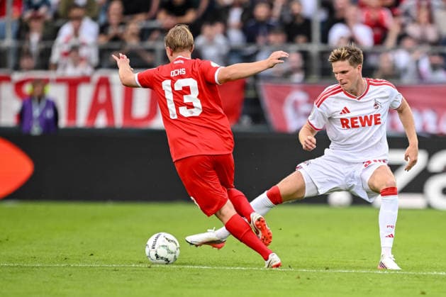 Philipp Ochs (FC Wuerzburger Kickers) und Marius Buelter (1.FC Koeln) im Zweikampf waehrend des DFB-Pokal 1 Runde Spiels zwichen Wuerzburger Kickers v 1.FC Koeln, AKON ARENA am 24. August 2026 in Wuerzburg, Deutschland. (Foto von Harry Langer DeFodi Images) +++ Philipp Ochs (FC Wuerzburger Kickers) und Marius Buelter (1.FC Koeln) battle for the ball during the DFB-Pokal 1 Runde match between Wuerzburger Kickers v 1.FC Koeln at AKON ARENA on August 24, 2026 in Wuerzburg, Germany. (Photo by Harry Langer DeFodi Images) (Photo by Harry Langer DeFodi Images) DFB DFL REGULATIONS PROHIBIT ANY USE OF PHOTOGRAPHS AS IMAGE SEQUENCES AND OR QUASI-VIDEO. - *** Philipp Ochs of FC Würzburger Kickers and Marius Buelter of 1. FC Köln in a tackle during the DFB Cup first-round match between Würzburger Kickers and 1. FC Köln, AKON ARENA on August 24, 2026, in Würzburg, Germany. Photo by Harry Langer, DeFodi Images. Philipp Ochs of FC Würzburger Kickers and Marius Buelter of 1. FC Köln battle for the ball during the DFB Cup first-round match between Würzburger Kickers and 1. FC Köln at AKON ARENA on August 24, 2026 in Würzburg, Germany. Photo by Harry Langer, DeFodi Images. Photo by Harry Langer, DeFodi Images. DFB and DFL regulations prohibit any use of photographs as image sequences and or quasi-video.