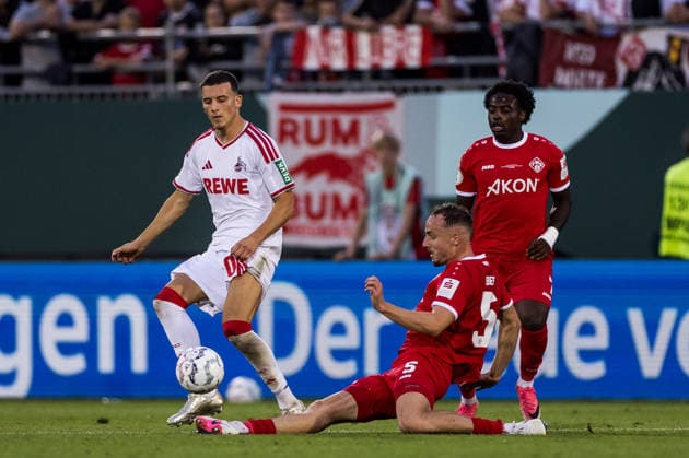 WUERZBURG, GERMANY - AUGUST 24: Said El Mala (1. FC Koeln, 10) controls the ball against Leo Eberle (Wuerzburger Kickers, 5) during the 1st round DFB Pokal match between Wuerzburger Kickers vs. 1. FC Koeln at AKON ARENA on August 24, 2026 in Wuerzburg, Germany. DFB REGULATIONS PROHIBIT ANY USE OF PHOTOGRAPHS AS IMAGE SEQUENCES AND OR QUASI-VIDEO. Bavaria Germany Copyright: xSteffiexWunderlx