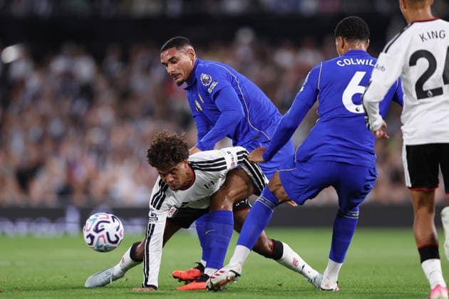 London, England, 24th August 2026. Oscar Bobb of Fulham is challenged by Maxence Lacroix of Chelsea and Levi Colwill of Chelsea during the Fulham vs Chelsea Premier League match at Craven Cottage, London. Picture credit should read: David Klein Sportimage EDITORIAL USE ONLY. No use with unauthorised audio, video, data, fixture lists, club league logos or live services. Online in-match use limited to 120 images, no video emulation. No use in betting, games or single club league player publications. SPI_067_DK_Fulham_Chelsea SPI-4933-0067