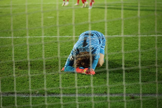 BERLIN, GERMANY - AUGUST 24: Enf of game, Torwart Goal Keeper Luis Zwick (VSG Altglienicke, 1), disappointed, dissatisfied, frustration, during the DFB Cup DFB Pokal match (Round 1) between DFB-Pokal: VSG Altglienicke - VfL Wolfsburg at Stadion auf dem Wurfplatz (Amateurstadion im Olympiapark) on August 24, 2026 in Berlin, Germany. DFL REGULATIONS PROHIBIT ANY USE OF PHOTOGRAPHS AS IMAGE SEQUENCES AND OR QUASI-VIDEO. Berlin Germany Copyright: xO.Frankex