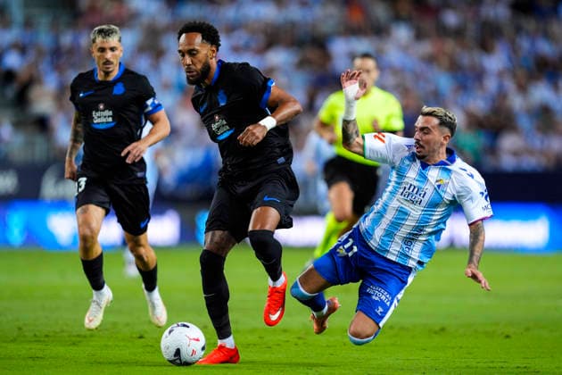 August 24, 2026, Malaga, Malaga, Spain: Joaquin Munoz of Malaga CF and Pierre-Emerick Aubameyang of RC Deportivo in action during the Spanish league, LaLiga EA Sports, football match played between Malaga CF and RC Deportivo at La Rosaleda stadium on August 24, 2026, in Malaga, Spain. Malaga Spain - ZUMAa181 20260824_zaa_a181_110 Copyright: xJoaquinxCorcherox