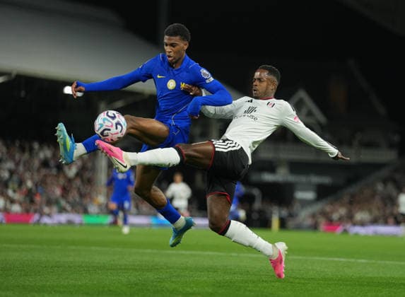 Fulham FC v FC Chelsea - Premier League - Season 2026 2027 - Matchday 1 - Craven Cottage Chelsea s Josh Acheampong and Fulham™s Ryan Sessegnon challenge during the Fulham vs Chelsea Premier League match at Craven Cottage, London, Season 26 27, 24 August 2026 EDITORIAL USE ONLY. No use with unauthorized audio, video, data, fixture lists, club league logos or live services. Online in-match use limited to 45 images, no video emulation. No use in betting, games or single club league player publications London United Kingdom