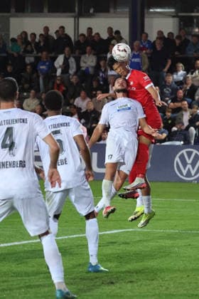 BERLIN, GERMANY - AUGUST 24: header, header duel between Ogulcan Tezel (VSG Altglienicke, 17) and Kento Shiogai (Wolfsburg, 7), during the DFB Cup DFB Pokal match (Round 1) between DFB-Pokal: VSG Altglienicke - VfL Wolfsburg at Stadion auf dem Wurfplatz (Amateurstadion im Olympiapark) on August 24, 2026 in Berlin, Germany. DFL REGULATIONS PROHIBIT ANY USE OF PHOTOGRAPHS AS IMAGE SEQUENCES AND OR QUASI-VIDEO. Berlin Germany Copyright: xO.Frankex