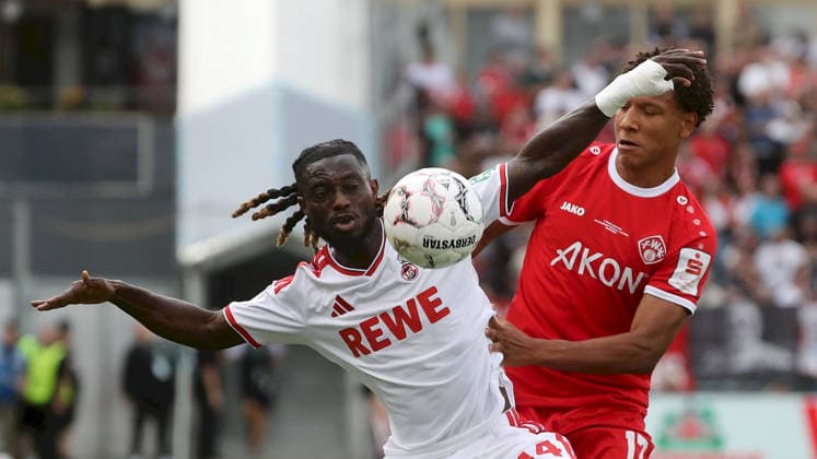 24.08.2026, xfsx, Herren, Fussball, Saison 2026 2027, DFB-Pokal, 1. Hauptrunde: FC Wuerzburger Kickers - 1. FC Koeln v.li.: Gideon Mensah (1. FC Koeln), Liam Omore (FC Wuerzburger Kickers) Wuerzburg AKON ARENA Bayern Deutschland *** August 24, 2026, xfsx, Men s, Soccer, 2026–2027 Season, DFB Cup, 1st Round: FC Würzburger Kickers vs. 1. FC Köln; Gideon Mensah (1. FC Köln), Liam Omore (FC Würzburger Kickers); Würzburg, AKON ARENA, Bavaria, Germany