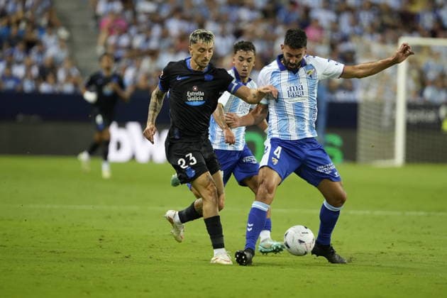 ESP: LaLiga EA Sports Malaga CF v Deportivo La Coruna Ximo Navarro of Deportivo La Coruna and Einar Galilea of Malaga during LaLiga EA Sports match between Malaga CF v Deportivo La Coruna played at La Rosaleda Stadium, Malaga on August 24 2026 in Spain Spain Soccer *** ESP LaLiga EA Sports Málaga CF vs. Deportivo La Coruna Ximo Navarro of Deportivo La Coruna and Einar Galilea of Málaga during the LaLiga EA Sports match between Málaga CF and Deportivo La Coruna played at La Rosaleda Stadium in Málaga on August 24, 2026, in Spain Spanish Soccer Copyright: xAgenciaxLOFx