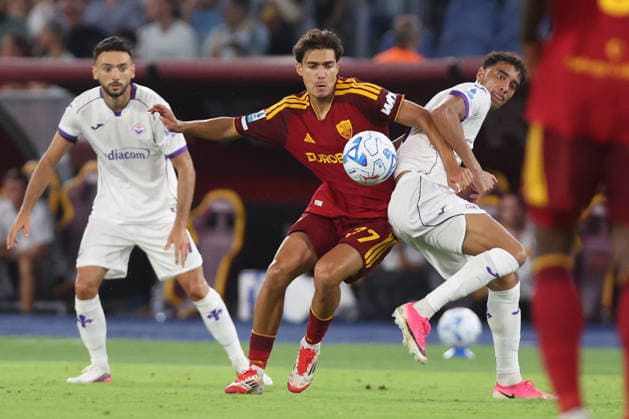 SOCCER - Serie A - AS Roma vs. ACF Fiorentina Photo by IPA ABACAPRESS.COM87773445 - Rome, Italy - August 24, 2026: Emanuele Lulli (right back) of AS Roma and Arthur Atta (central midfielder) of ACF Fiorentina are seen in action during the 2026–2027 Italian Serie A – Enilive Championship soccer match between AS Roma and ACF Fiorentina at the Olympic Stadium in Rome. Rome Italy  Copyright: xIPAxSport ABACAx