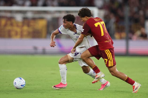 SOCCER - Serie A - AS Roma vs. ACF Fiorentina Photo by IPA ABACAPRESS.COM87773547 - Rome, Italy - August 24, 2026: Arthur Atta (central midfielder) of ACF Fiorentina and Emanuele Lulli (right back) of AS Roma are seen in action during the 2026–2027 Italian Serie A—Enilive Championship soccer match between AS Roma and ACF Fiorentina at the Olympic Stadium in Rome. Rome Italy  Copyright: xIPAxSport ABACAx
