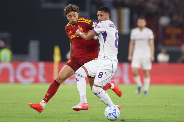 SOCCER - Serie A - AS Roma vs. ACF Fiorentina Photo by IPA ABACAPRESS.COM87773658 - Rome, Italy — August 24, 2026: Neil El Aynaoui (central midfielder) of AS Roma and Rolando Mandragora (defensive midfielder) of ACF Fiorentina are seen in action during the 2026–2027 Italian Serie A Enilive Championship soccer match between AS Roma and ACF Fiorentina at the Olympic Stadium in Rome. Rome Italy  Copyright: xIPAxSport ABACAx