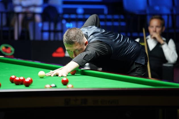 WUHAN, CHINA - AUGUST 25: Kyren Wilson of England plays a shot in the third round match against Ali Carter of England on day 3 of Wuhan Open 2026 at the Optics Valley Gymnasium of Huazhong University of Science and Technology on August 25, 2026 in Wuhan, Hubei Province of China.  Copyright: xTaixChengzhex 111662031237