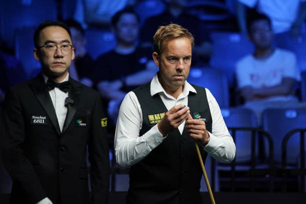 WUHAN, CHINA - AUGUST 25: Ali Carter of England chalks the cue in the third round match against Kyren Wilson of England on day 3 of Wuhan Open 2026 at the Optics Valley Gymnasium of Huazhong University of Science and Technology on August 25, 2026 in Wuhan, Hubei Province of China.  Copyright: xTaixChengzhex 111662031235
